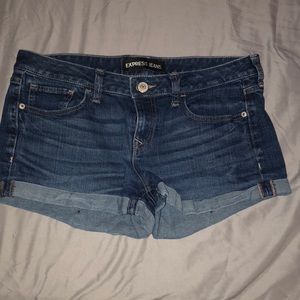 Medium wash shorts from Express